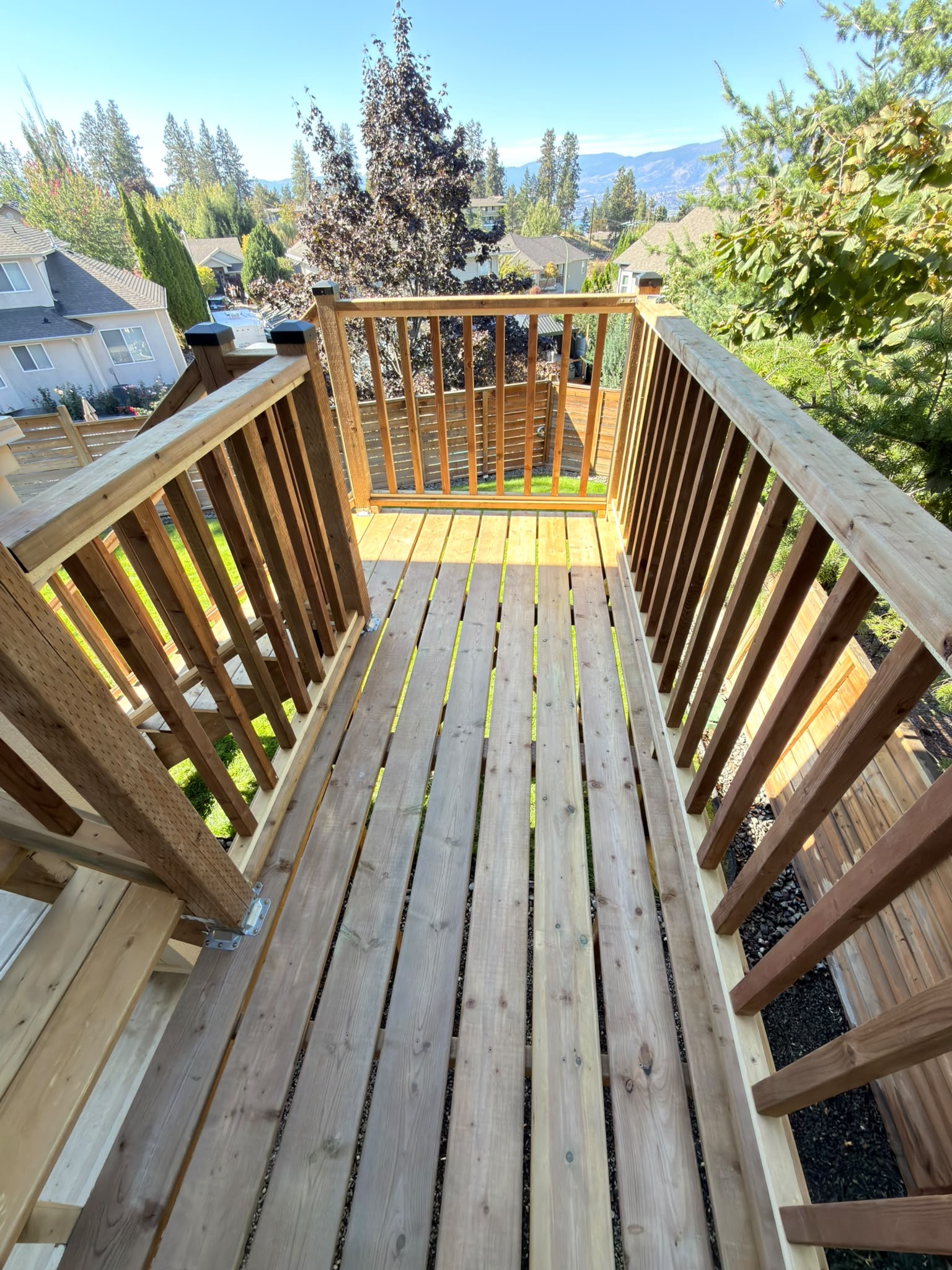Finished wood deck with railings