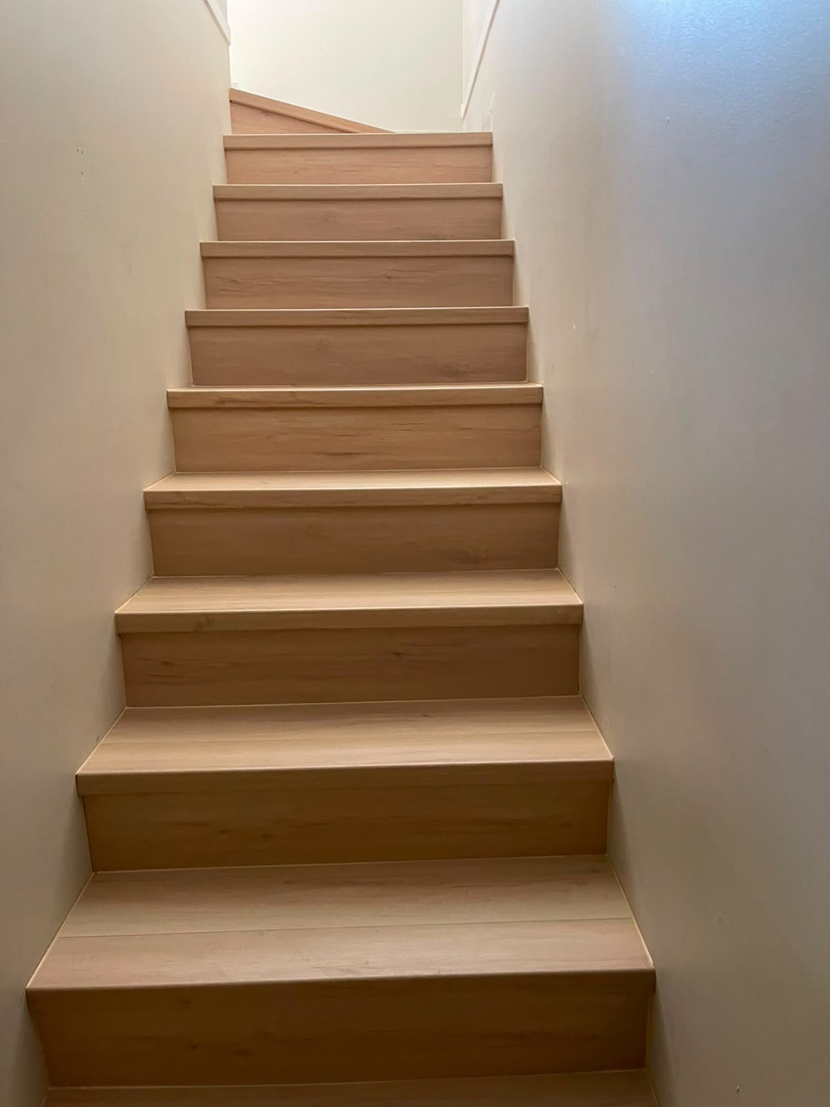 Wood staircase with painted walls